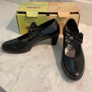 Naot Luma heels. Black leather and patent.